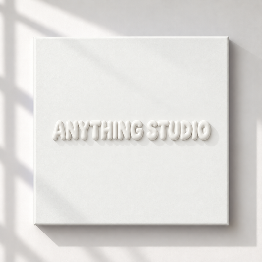 ANYTHING STUDIO sculptural lettering canvas in white on a white wall